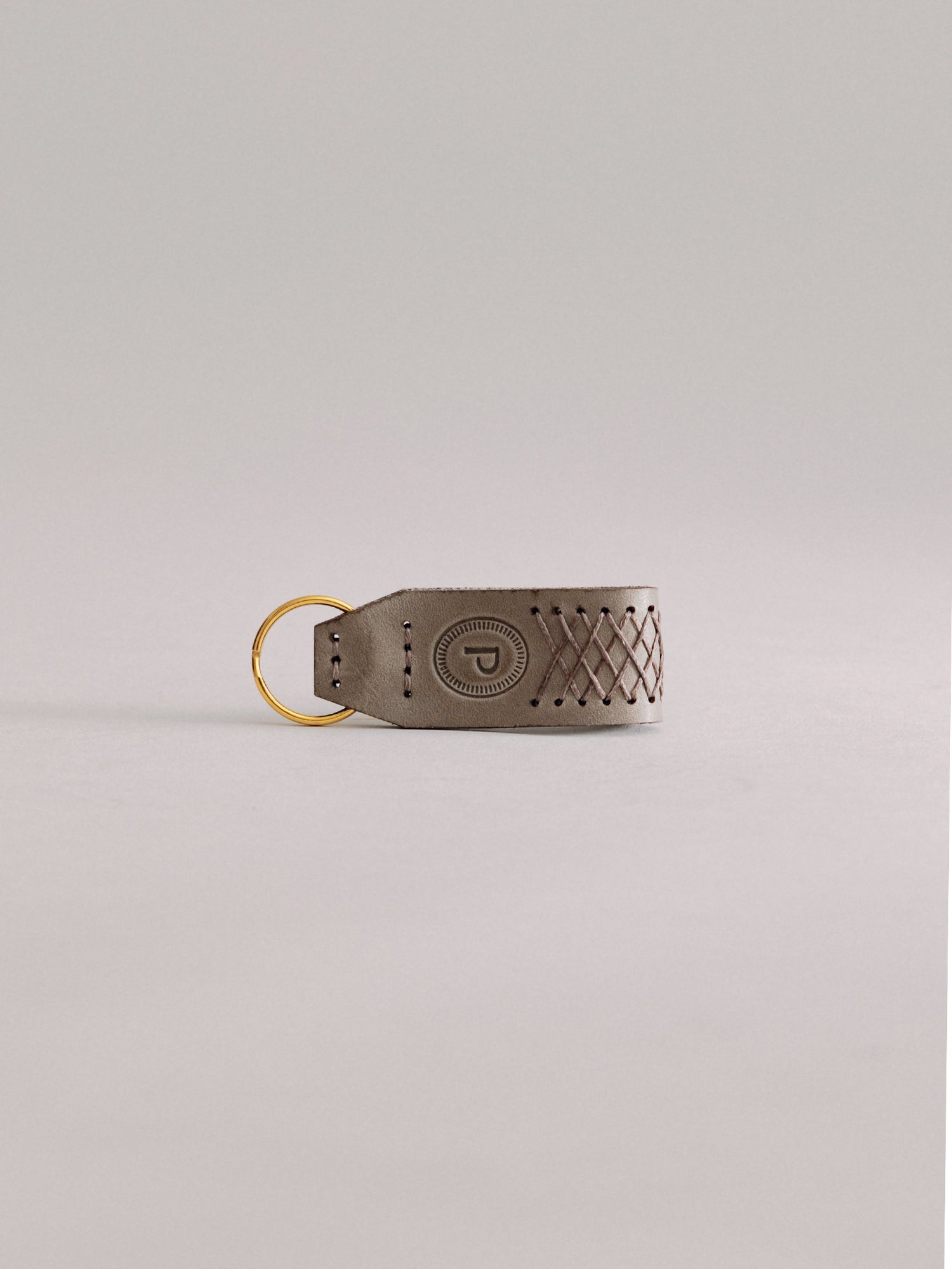 Pintu Keychain - Grey/Brown - Brass