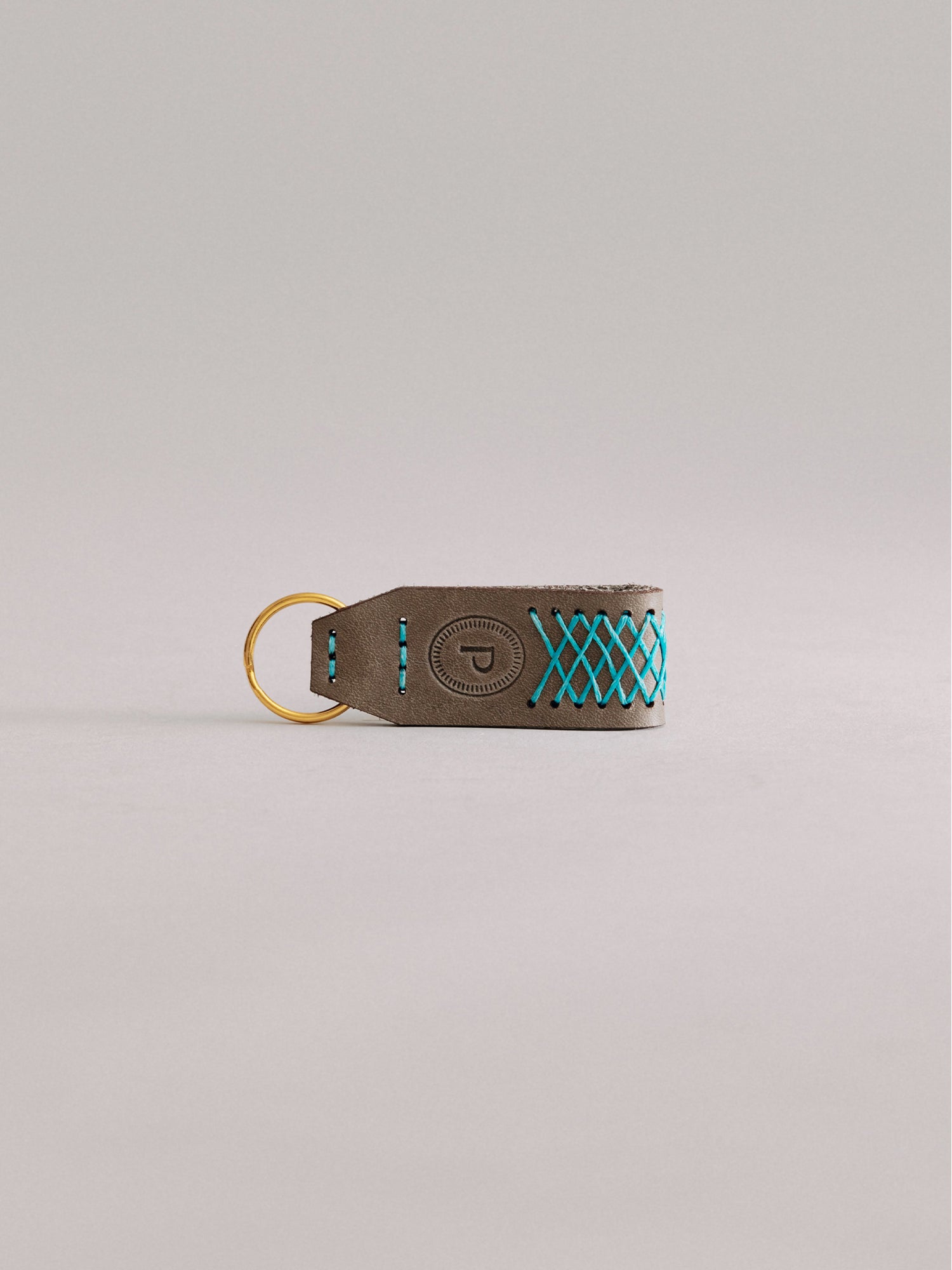Pintu Keychain - Grey/Turquoise - Brass
