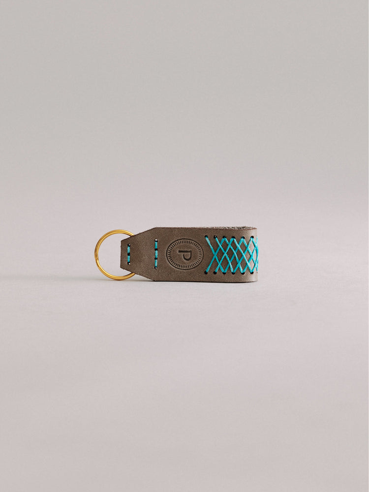 Pintu Keychain - Grey/Turquoise - Brass